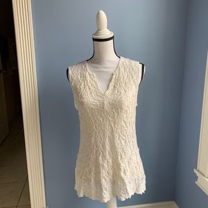 Snoskins V-neck white sleeveless shirt